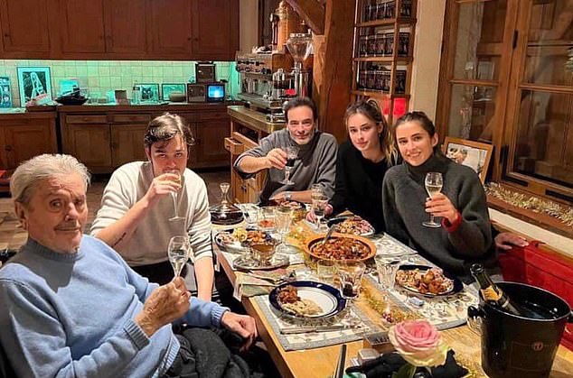 The Japanese-born film worker said yesterday that Delon's three children - Alain-Fabien (2nd L), Anouchka (right) and Anthony (centre) - refused to let her see the actor (left) after his death.