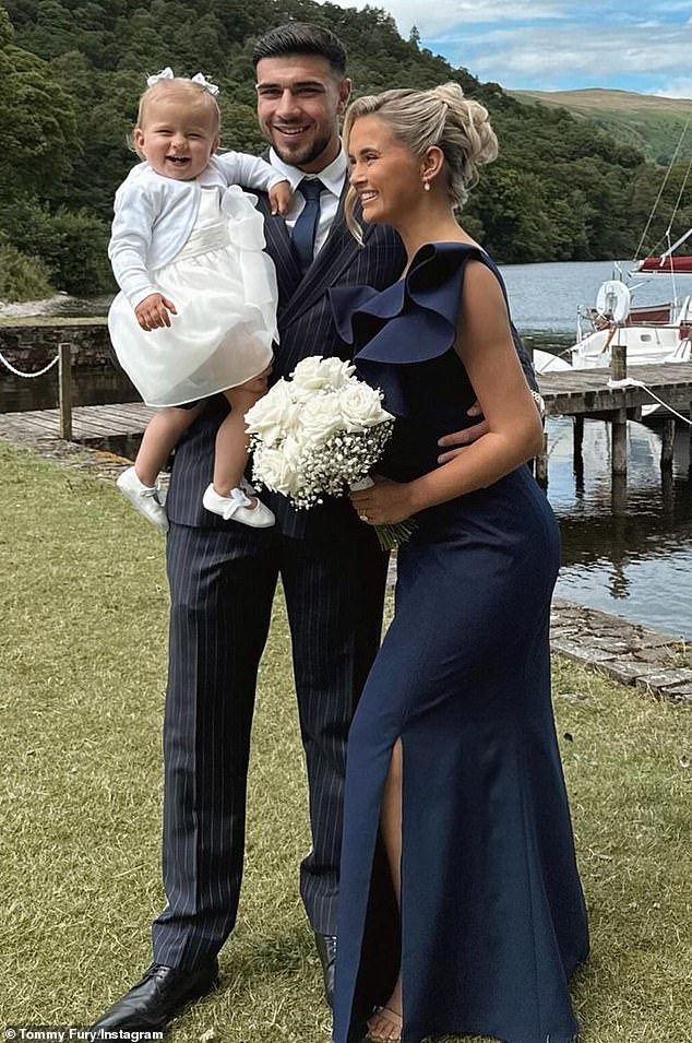 The former couple with their 19-month-old daughter Bambi at a wedding this year.