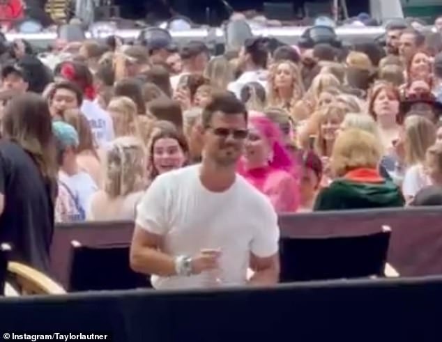 Taylor took it all in her stride as she declared to the crowd, which included her ex Taylor Lautner (pictured): 'I think when it rains for more than SIX MINUTES, we can officially declare it a rain show!'