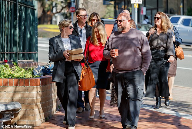 Michelle Millen (in red) told the court the family has struggled with Cameron's death.