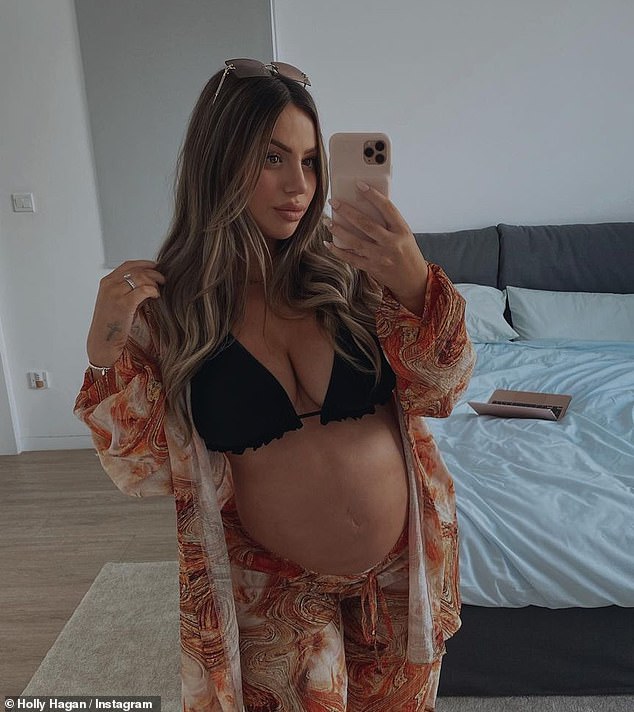 Holly welcomed her first child, Alpha Jax, in June with partner Jacob Blyth and revealed she gained 50lbs during her pregnancy (pictured August 2023)