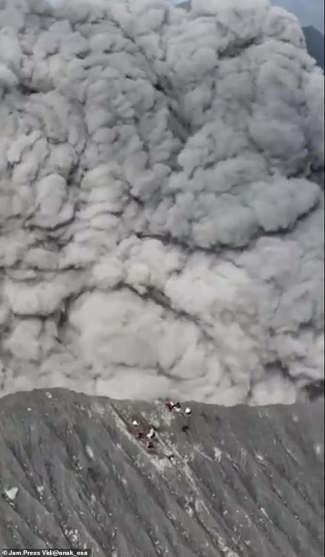 A huge cloud of ash was seen rising from the crater, some 8,000 feet into the air.