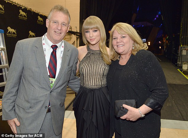 Taylor's parents are almost as popular among Swifties as the singer herself (in the 2013 photo, both Taylor's mother and father are supporting her on tour).