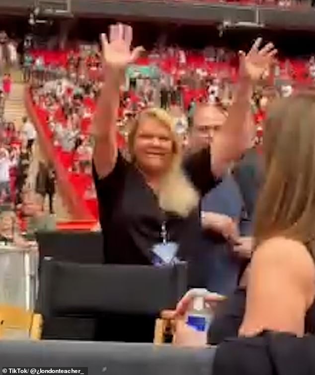 Andrea (pictured) and Scott were seen having a great time as they watched their daughter storm the stage at Wembley on Thursday.