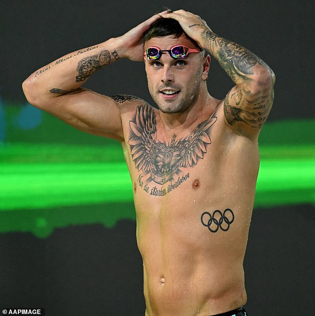 The International Olympic Committee is allowing athletes such as Australian star Kyle Chalmers to compete while displaying his Olympic tattoo (pictured)