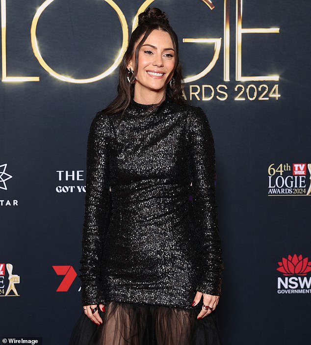 While there was no clue as to how she was injured, Carrie was pretty sure she had identified the culprit as none other than Australian Idol judge Amy Shark (pictured).