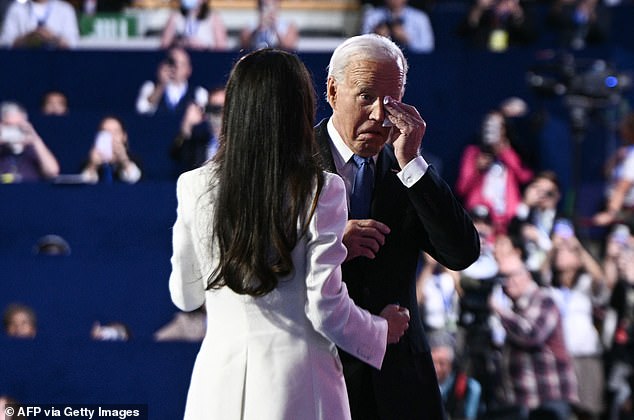 President Joe Biden gets emotional as his daughter Ashley Biden welcomes him on stage on the first day of the Democratic National Convention