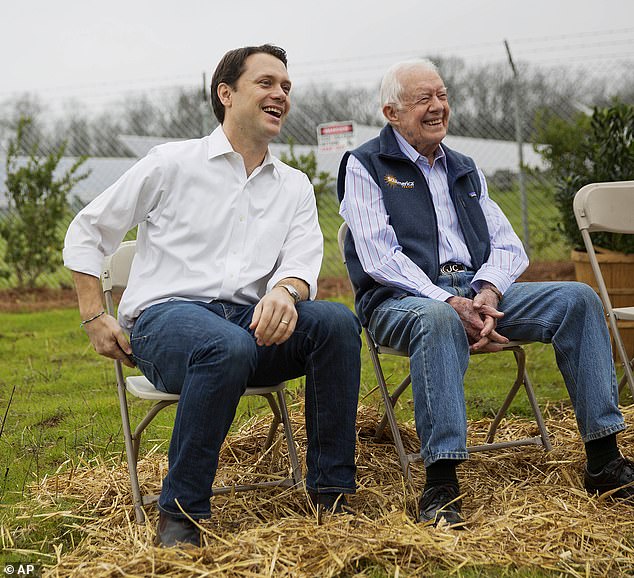 Jimmy Carter's eldest grandson Jason (left) revealed that the 99-year-old former president is no longer awake every day after 16 months in hospice care at home.