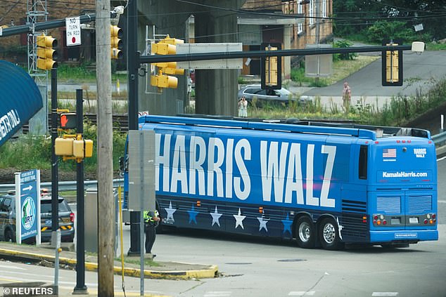 Print: Walz spoke about seeing his last name written in huge capital letters on the Harris-Walz campaign bus