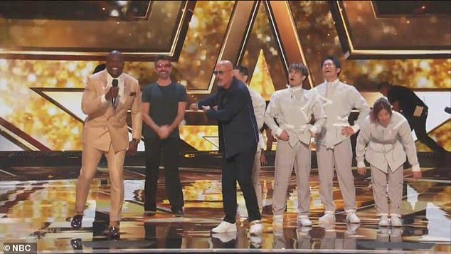 Simon even took to the stage to celebrate with the group Golden Buzzer.