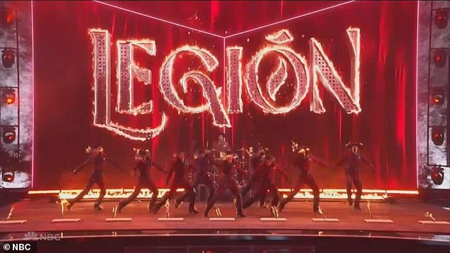 Legion, a dance group from Buenos Aires, Argentina, performed with their boots on fire to open the second quarterfinal match live