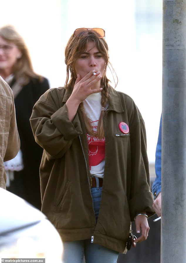 Mia smoked a cigarette as she walked from her car to the popular restaurant to spend a fun-filled day with her friends.