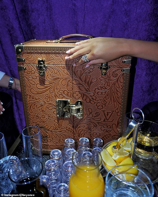 A bottle of whiskey was kept in an elaborate case.