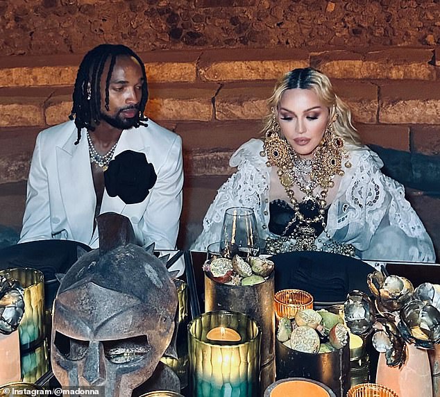 Fans were treated to a glimpse of Madonna's lavish celebrations, where the Material Girl singer enjoyed a lavish banquet with a seat next to her boyfriend.