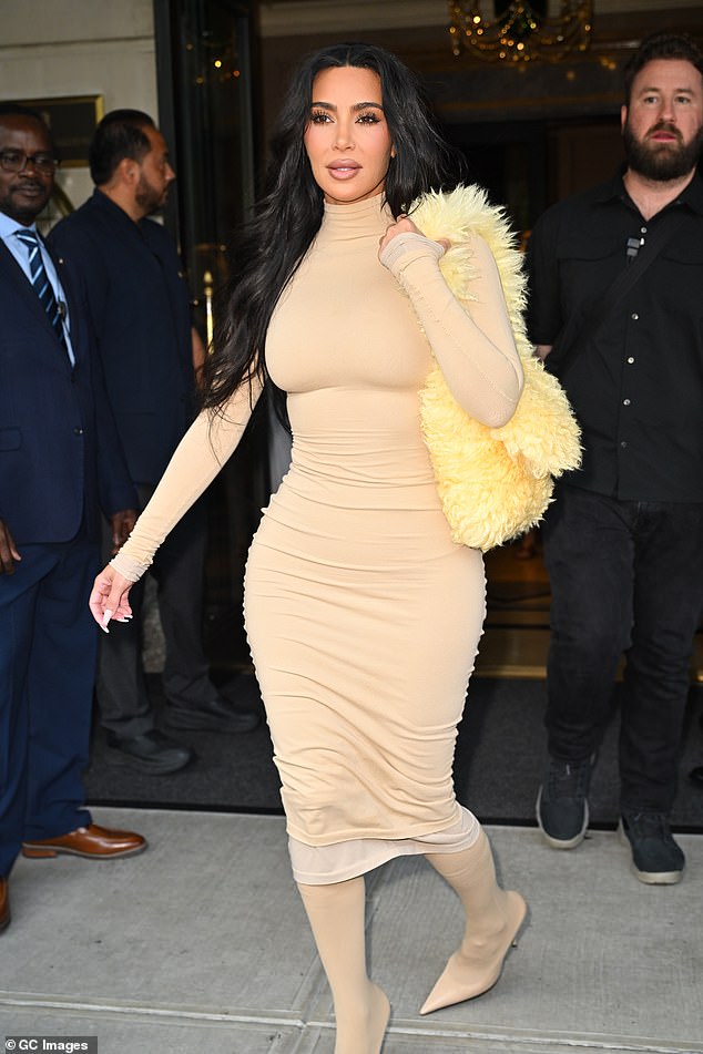 But the Kim Kardashian lookalike (pictured), influencer and glamour model, who admitted to travelling to Turkey for her surgery, still wants another boob job and a fox eye lift, known as 