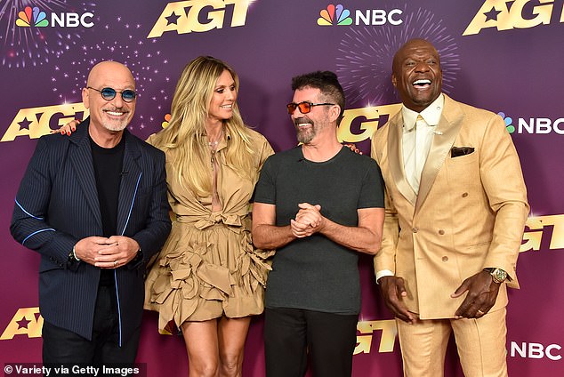 The duo were also seen posing alongside fellow judge Howie Mandel, who dressed dapper in a navy blazer for the evening, and show host Terry Crews.