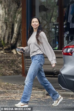 The former model, 47, cut a casual figure for her North Coast outing, sporting a pair of relaxed-fit light blue jeans and a loose-fitting light grey jumper.