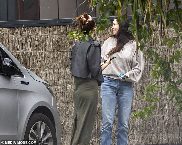 The brunette beauty looked chic as she ran errands in the coastal city.