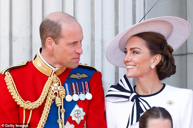 Kate and William share a smile on the balcony during the Trooping the Colour parade in June