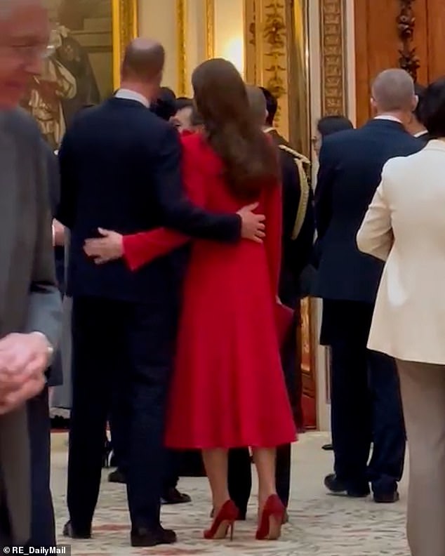 The couple embrace during the state reception for South Korea's President Yoon Suk Yeol and First Lady Kim Keon Hee.