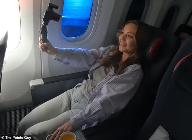 Travel content creator Maz Green put premium economy class to the test (above)