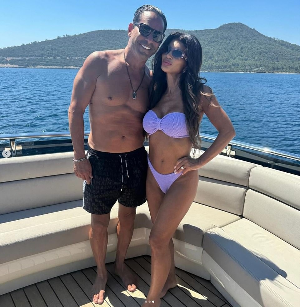 Giudice was spotted in Turkey. The TV star posed in a purple strapless bikini while on a yacht with her husband.