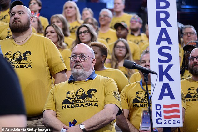 Members of the Nebraska delegation wore T-shirts featuring notable figures born in the state, including Malcolm X, Sitting Bull and Willa Cather.