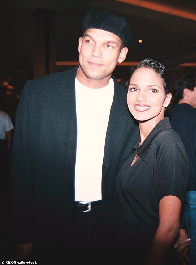 Berry was married to baseball player David Justice from 1992 to 1996. They divorced in 1997 and Berry filed for a restraining order (pictured in 1995).