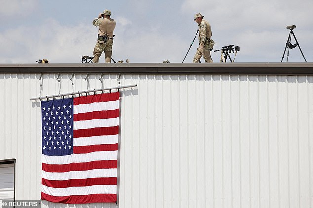 Members of the security forces guard the day of a campaign rally held by former US President Donald Trump at the Asheboro Regional Airport in Asheboro, North Carolina, US, on August 21, 2024.