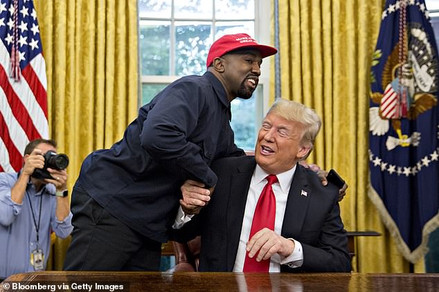 Earlier this week, insiders told DailyMail.com that the couple's impromptu stop at a Donald Trump rally left friends deeply concerned for their safety (West pictured with Trump in 2018)