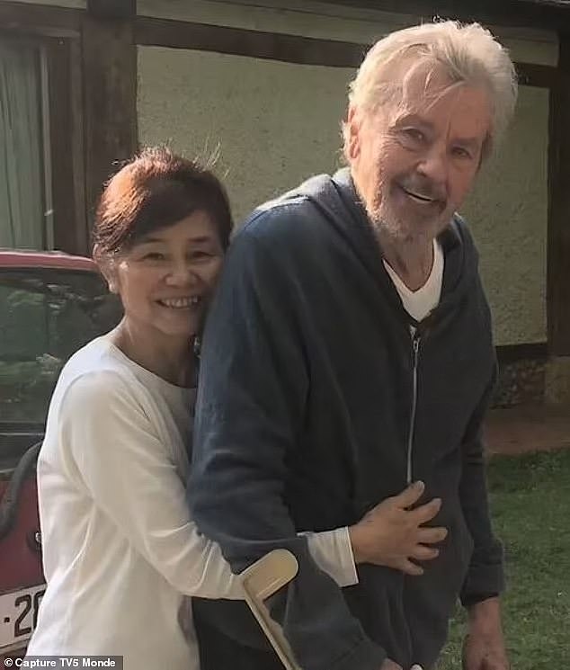 Hiromi Rollin, 66, had been living part-time with the ailing Delon as his assistant and carer for about 17 years, but said the couple had been in love for three decades.