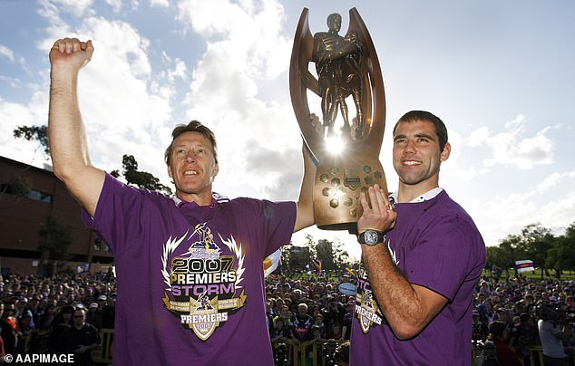 Craig Bellamy and the Storm lifted the NRL trophy in 2007 (above) and 2009, but were stripped of both titles in 2010 due to salary cap breaches.