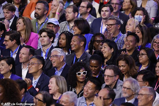 Members of the crowd laughed at some of his popular jokes.