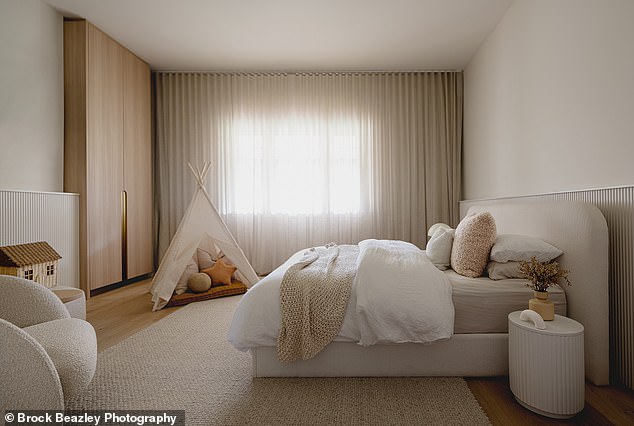 The children's bedrooms have transparent curtains, which allow natural light to enter.