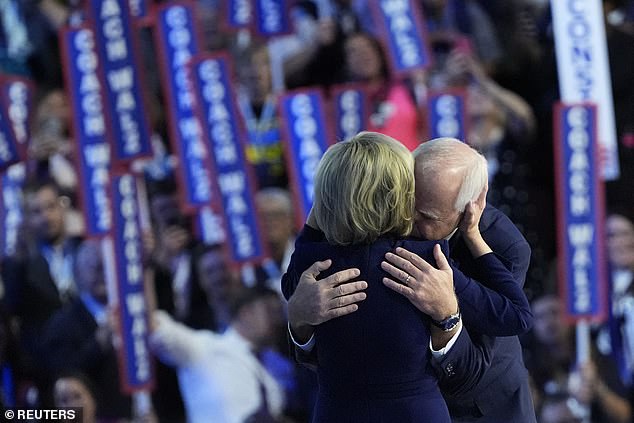 Walz hugs his wife Gwen on stage after accepting the vice presidential nomination. She spoke in a video introducing her husband earlier in the evening