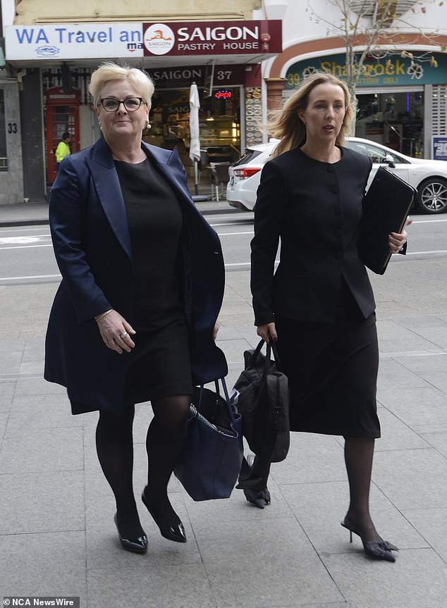 Linda Reynolds is pictured, left, outside the Supreme Court in Washington in early August.