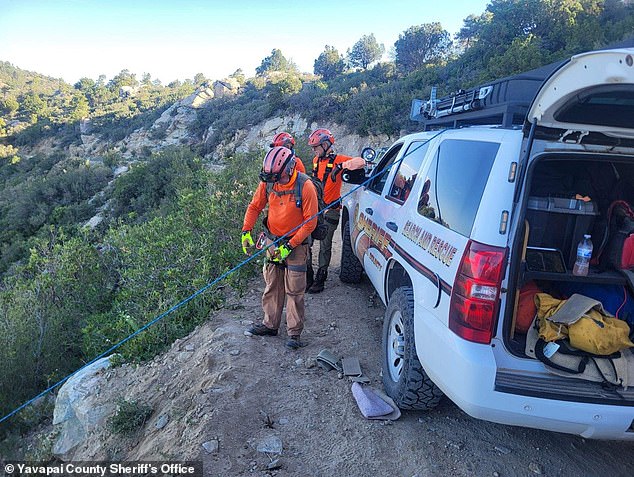 Officials said her car plunged 1,000 feet (300 meters) down the steep terrain and she was thrown from the vehicle about halfway down the mountainside.