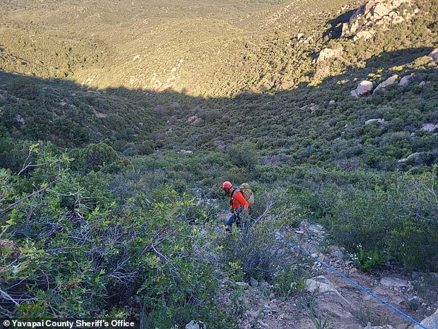 Due to the terrain and darkness, Yavapai County Sheriff's Office deputies had to wait all night to recover his body, never leaving his side.