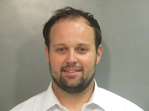 Josh Duggar is currently serving a 12-and-a-half-year prison sentence in connection with his 2021 conviction for downloading child sexual abuse images. He is pictured in a mugshot from December 2021.