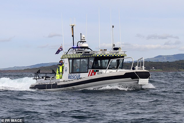 A rescue boat is pictured Tuesday amid the search for the father and son.