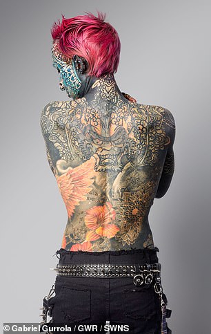 Now, her tattoos extend from her scalp to the soles of her feet, including her eyelids, eyeballs, gums and tongue.