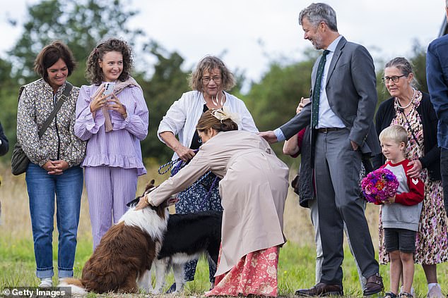 The Danish monarch's affection for her four-legged fans during her recent tour is no surprise.