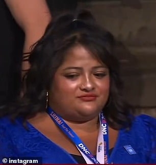 The broadcast awkwardly cut to a bewildered woman (pictured), now identified as Woorman, just after Winfrey said the cat line. The delegate quickly turned away as if to avoid the unfortunate moment.