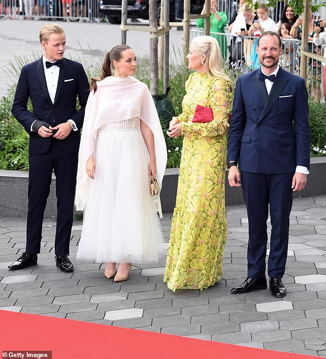 Marius Borg Høiby, 27 (left), spent more than 30 hours in custody after an incident at an apartment in Frogner, Oslo, where a woman in her 20s called police earlier this month (pictured with Princess Ingrid Alexandra, Crown Prince Haakon and the Crown Princess in 2022)