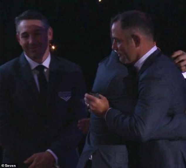 Football fans were delighted to see Smith and Cronk embrace (pictured) after their bitter falling out in 2017 when the scrum-half left Melbourne to join the Roosters.