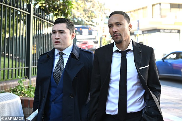 Former Macarthur FC player Kearyn Baccus, right, arrives at Campbelltown Local Court