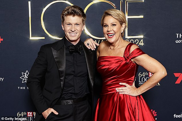 The reality TV star surprised fans on Sunday when she appeared at the Logie Awards with a very surprising date - her I'm A Celebrity... Get Me Out of Here co-host Julia Morris. They are pictured together.