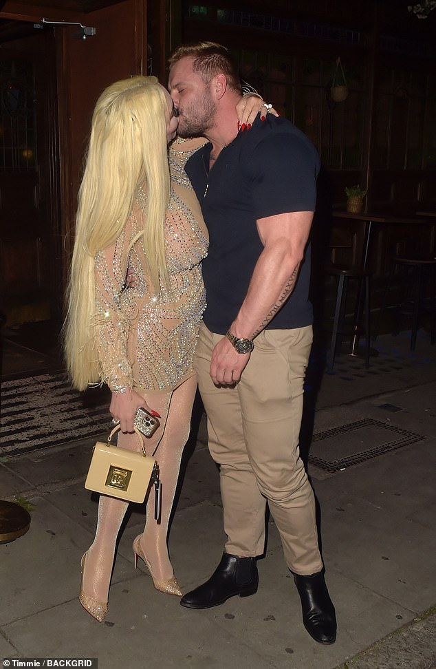 The 41-year-old TV personality looked as glamorous as ever in a semi-sheer mesh mini dress for an evening out at Sican restaurant on Tottenham Court Road.