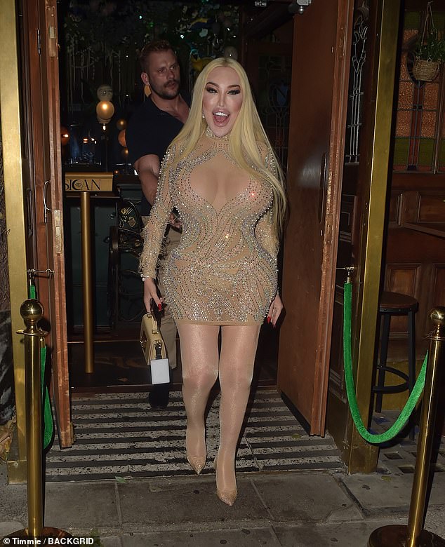 The 41-year-old TV personality looked as glamorous as ever in a semi-sheer mesh mini dress.