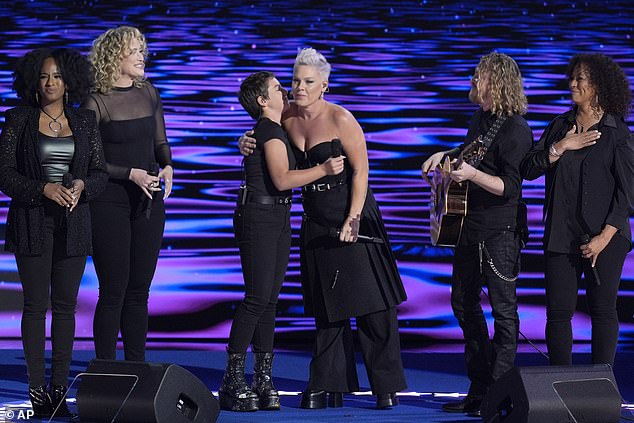 The mother-daughter duo coordinated colors in all-black ensembles as they stood side by side under the bright stage lights.